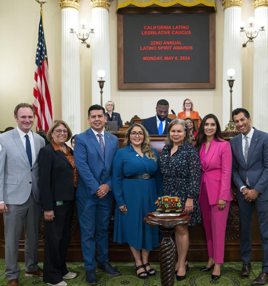 A group of representatives from MANA  receiving the Latino Spirit Award for Achievement in Community Empowerment from the California Latino Legislative Caucus Foundation