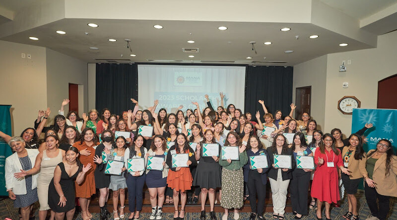 A group of women part of MANA's hermanitas program celebrate being college bound.